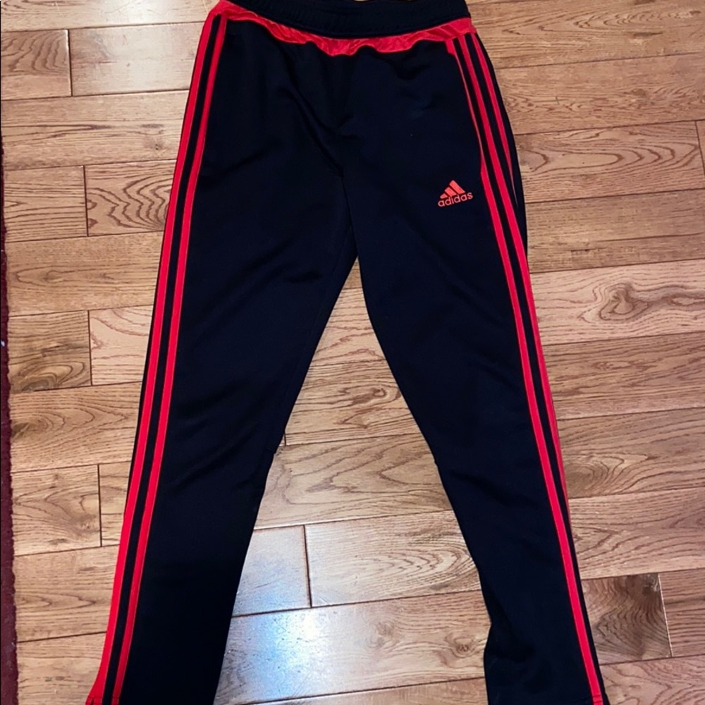 Red striped Adidas track pants